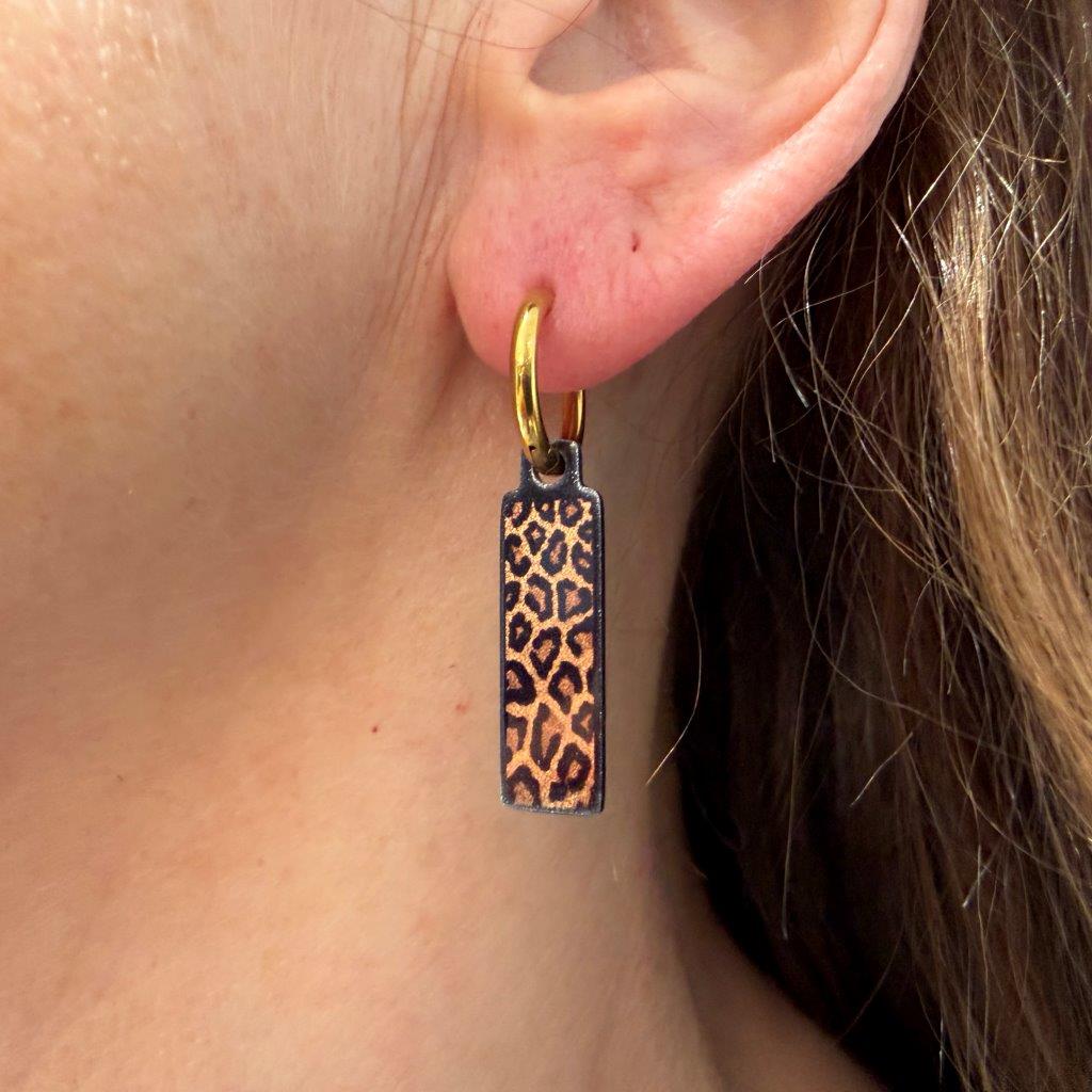 Spots panther metallic oorbellen