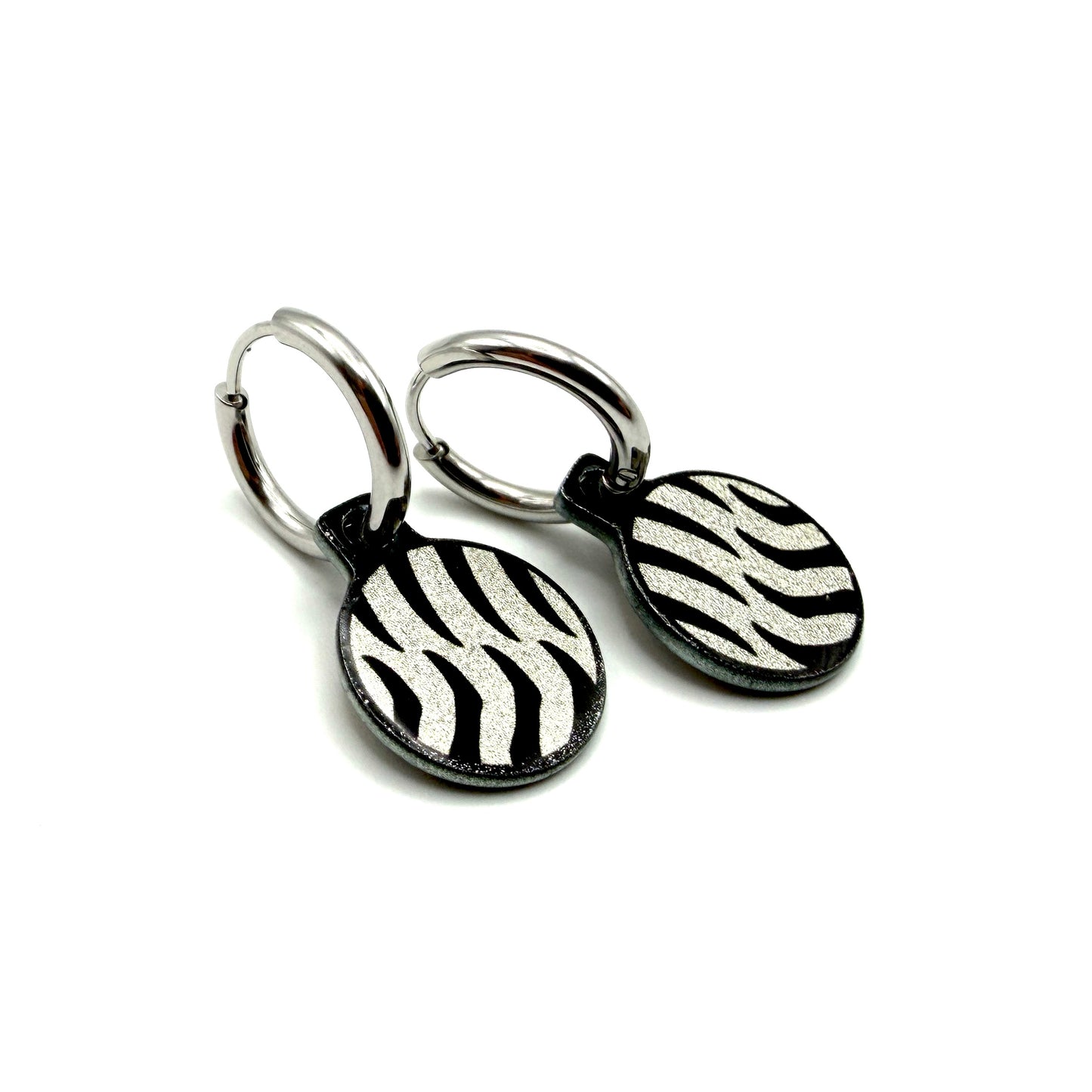 Zebra silver and rosgold metallic oorbellen